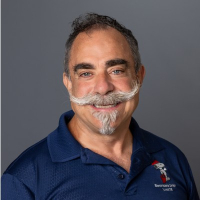 A real photographic portrait of Don Slaiman, IBEW Local 26’s director of community relations.